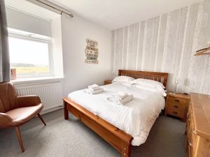 Bedroom one- click for photo gallery